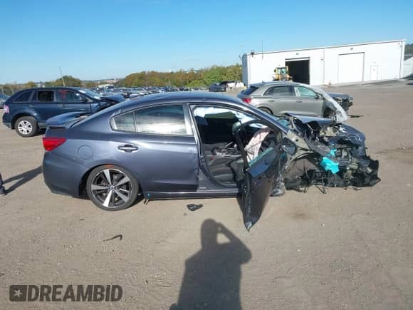 2017 Subaru Impreza Special Sports with VIN 4S3GKAM63H3606402, listed as a IAAI auction lot 43418470 with 69,065 mi miles and . Bid and sale history available at DreamBid. Image 12.