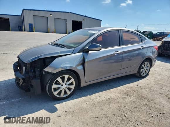2014 Hyundai Accent GLS z VIN KMHCU4AE8EU624837, wystawiony jako Copart lot #85711535 z przebiegiem 127 432 mil mil oraz Szkoda całkowita • Salvage title. Historia ofert i sprzedaży dostępna na DreamBid. Obrazek 1.