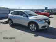 2019 Honda HR-V LX z VIN 3CZRU5H31KG701419, wystawiony jako Copart lot #69430145 z przebiegiem 117 018 mil mil oraz Szkoda całkowita • Salvage title. Historia ofert i sprzedaży dostępna na DreamBid. Obrazek 4.