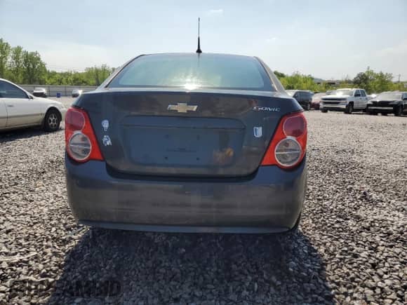 2013 Chevrolet Sonic LS с VIN 1G1JA5SH0D4212874, выставлен на аукционе Copart как лот 53473645 с пробегом 107 555 миль миль и Списание • Salvage title. История ставок и продаж доступна на DreamBid. Изображение 6.