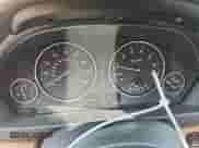 2014 BMW 3 Series 328i xDrive with VIN WBA3B3C51EJ981034, listed as a Copart auction lot 71869695 with 160,025 mi miles and Salvage title. Bid and sale history available at DreamBid. Image 9.