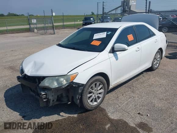 2012 Toyota Camry L z VIN 4T1BF1FK2CU630231, wystawiony jako IAAI lot #43021349 z przebiegiem 138 845 mil mil oraz . Historia ofert i sprzedaży dostępna na DreamBid. Obrazek 2.