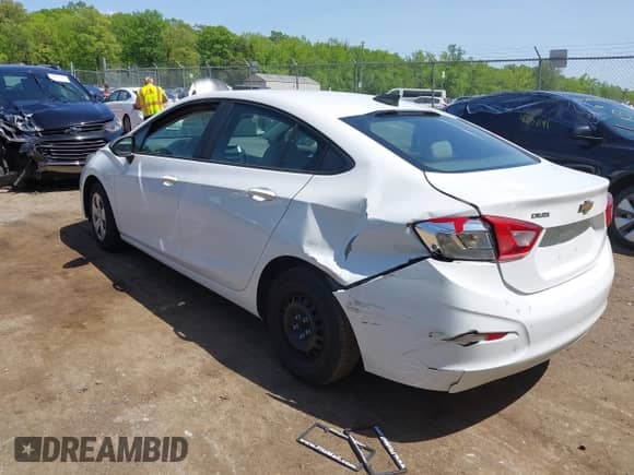 2018 Chevrolet Cruze LS with VIN 1G1BB5SM6J7117261, listed as a IAAI auction lot 42157339 with 146,013 mi miles and . Bid and sale history available at DreamBid. Image 3.