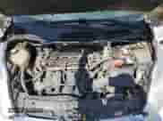 2011 Ford Fiesta SE z VIN 3FADP4BJ2BM239601, wystawiony jako Copart lot #70484235 z przebiegiem 145 671 mil mil oraz Szkoda całkowita • Salvage title. Historia ofert i sprzedaży dostępna na DreamBid. Obrazek 11.