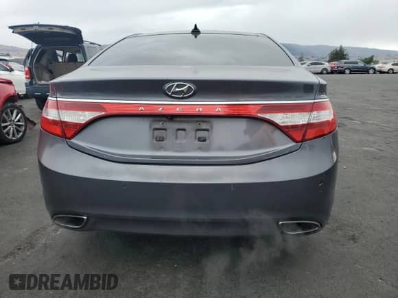 2012 Hyundai Azera с VIN KMHFH4JG6CA190810, выставлен на аукционе Copart как лот 81902675 с пробегом 204 579 миль миль и Списание • Salvage title. История ставок и продаж доступна на DreamBid. Изображение 6.