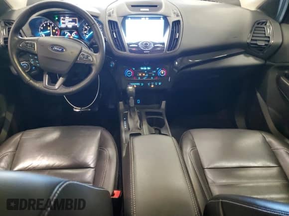 2017 Ford Escape Titanium with VIN 1FMCU9JD1HUA79587, listed as a Copart auction lot 84209285 with 61,058 mi miles and Clean title. Bid and sale history available at DreamBid. Image 8.