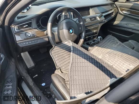 2015 BMW 7 Series 750i xDrive with VIN WBAYB6C56FD225478, listed as a Copart auction lot 67035785 with 130,037 mi miles and Salvage title. Bid and sale history available at DreamBid. Image 8.