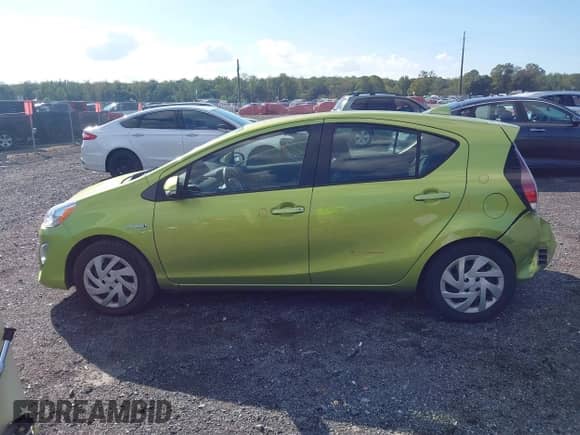 2015 Toyota Prius One with VIN JTDKDTB36F1088691, listed as a IAAI auction lot 43285642 with 87,878 mi miles and . Bid and sale history available at DreamBid. Image 14.