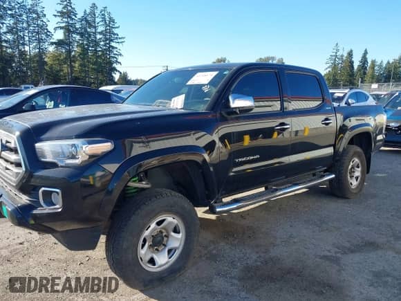 2016 Toyota Tacoma Limited z VIN 3TMGZ5AN8GM025523, wystawiony jako IAAI lot #43248174 z przebiegiem 121 943 mil mil oraz . Historia ofert i sprzedaży dostępna na DreamBid. Obrazek 2.