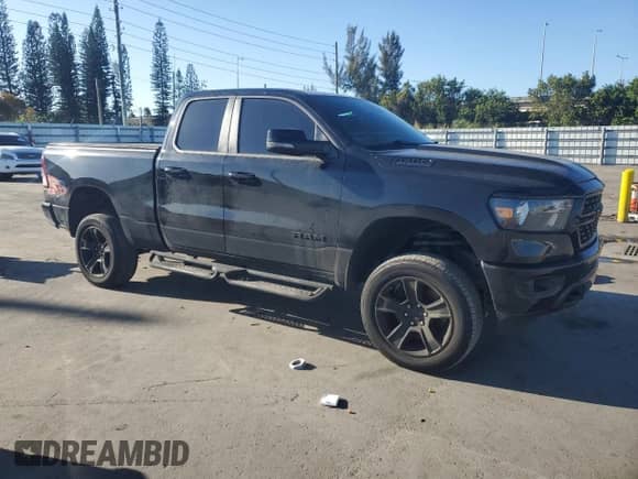 2023 Ram 1500 Lone Star z VIN 1C6RREBTXPN553048, wystawiony jako Copart lot #46255525 z przebiegiem 59 497 mil mil oraz Szkoda całkowita • Salvage title. Historia ofert i sprzedaży dostępna na DreamBid. Obrazek 4.