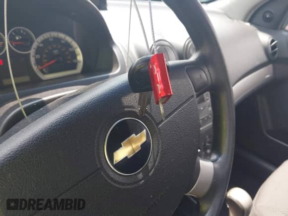 2007 Chevrolet Aveo LS with VIN KL1TD56627B055436, listed as a IAAI auction lot 42462092 with 102,923 mi miles and . Bid and sale history available at DreamBid. Image 11.