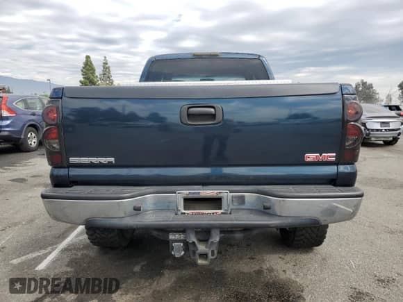 1999 GMC Sierra 1500 SL with VIN 1GTEK19TXXE506578, listed as a Copart auction lot 85857155 with 180,128 mi miles and Salvage title. Bid and sale history available at DreamBid. Image 6.
