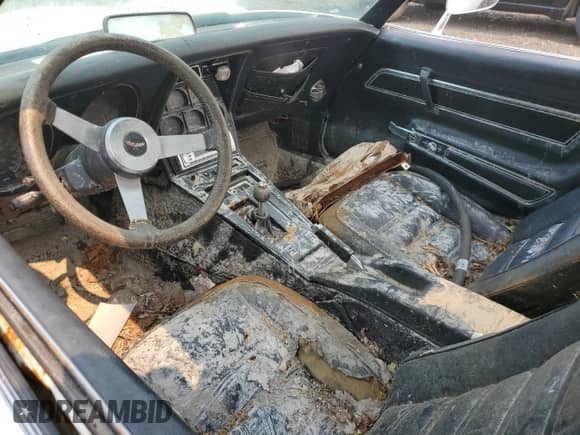 1977 Chevrolet Corvette with VIN 1Z37L7S405465, listed as a Copart auction lot 54827283 with Not provided miles and Salvage title. Bid and sale history available at DreamBid. Image 8.