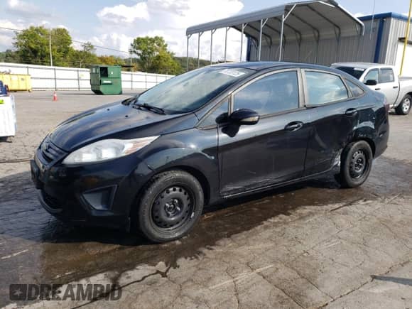 2012 Ford Fiesta S with VIN 3FADP4AJ8CM121345, listed as a Copart auction lot 70723125 with 113,935 mi miles and Salvage title. Bid and sale history available at DreamBid. Image 1.