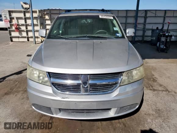 2009 Dodge Journey SXT с VIN 3D4GG57V59T241760, выставлен на аукционе Copart как лот 80456025 с пробегом 212 459 миль миль и Списание • Salvage title. История ставок и продаж доступна на DreamBid. Изображение 5.