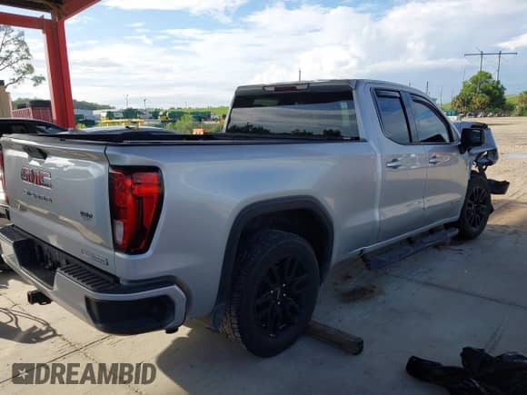 2019 GMC Sierra 1500 Elevation with VIN 1GTR8CED8KZ266443, listed as a IAAI auction lot 42662811 with 115,079 mi miles and . Bid and sale history available at DreamBid. Image 4.