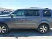 2014 Honda Pilot Touring with VIN 5FNYF3H98EB003274, listed as a IAAI auction lot 42815552 with 223,025 mi miles and . Bid and sale history available at DreamBid. Image 14.