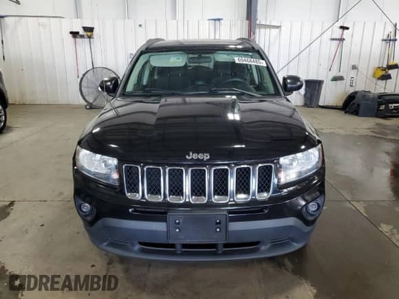 2014 Jeep Compass Sport with VIN 1C4NJDBB9ED842554, listed as a Copart auction lot 69468485 with 124,308 mi miles and Salvage title. Bid and sale history available at DreamBid. Image 5.