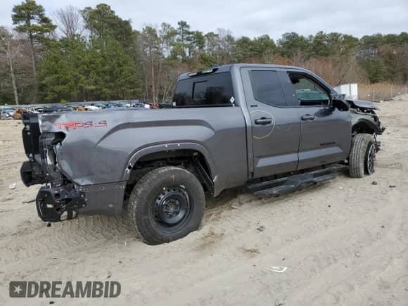 2023 Toyota Tundra SR5 with VIN 5TFLA5DA4PX065963, listed as a Copart auction lot 48775395 with 28,681 mi miles and Salvage title. Bid and sale history available at DreamBid. Image 3.