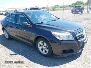 2013 Chevrolet Malibu LS z VIN 1G11B5SA5DF165779, wystawiony jako IAAI lot #42907632 z przebiegiem 100 927 mil mil oraz . Historia ofert i sprzedaży dostępna na DreamBid. Obrazek 1.
