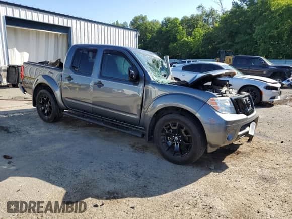 2019 Nissan Frontier SV with VIN 1N6AD0ERXKN715385, listed as a Copart auction lot 62362415 with 94,932 mi miles and Salvage title. Bid and sale history available at DreamBid. Image 4.