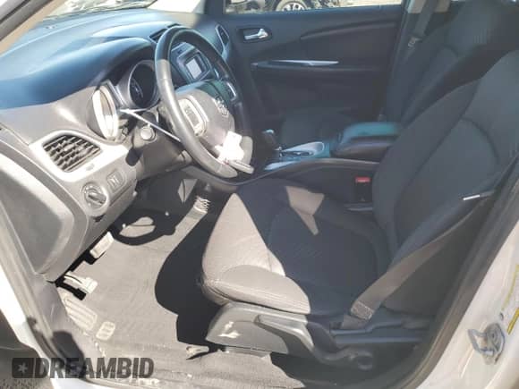 2015 Dodge Journey SE with VIN 3C4PDCAB2FT516876, listed as a Copart auction lot 84073205 with 154,462 mi miles and Salvage title. Bid and sale history available at DreamBid. Image 7.