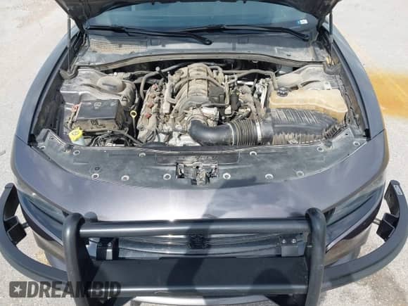 2020 Dodge Charger Police z VIN 2C3CDXKT4LH120180, wystawiony jako IAAI lot #42834441 z przebiegiem 128 459 mil mil oraz . Historia ofert i sprzedaży dostępna na DreamBid. Obrazek 10.