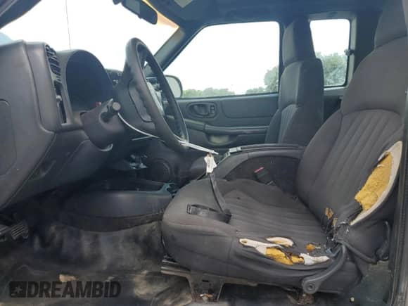 2003 Chevrolet S-10 LS с VIN 1GCDT19X038215432, выставлен на аукционе Copart как лот 61661165 с пробегом 219 435 миль миль и Списание • Salvage title. История ставок и продаж доступна на DreamBid. Изображение 7.