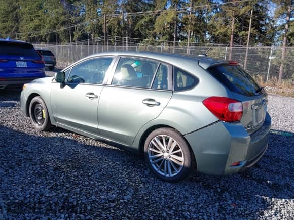 2014 Subaru Impreza Premium with VIN JF1GPAE61E8275730, listed as a IAAI auction lot 43409579 with 68,890 mi miles and . Bid and sale history available at DreamBid. Image 3.