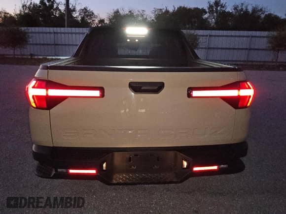 2024 Hyundai Santa Cruz SEL с VIN 5NTJB4AE2RH098952, выставлен на аукционе Copart как лот 80526854 с пробегом 9 783 миль миль и Чистый • Clean title. История ставок и продаж доступна на DreamBid. Изображение 6.