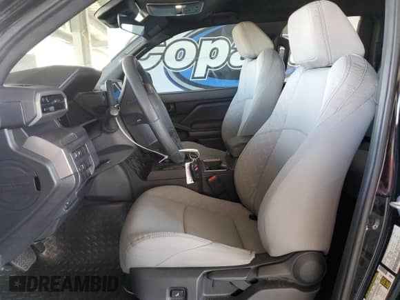 2024 Toyota Tacoma SR5 with VIN 3TMKB5FN9RM023449, listed as a Copart auction lot 67866095 with 5,550 mi miles and Salvage title. Bid and sale history available at DreamBid. Image 7.