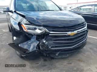 2020 Chevrolet Traverse LT z VIN 1GNEVHKWXLJ147035, wystawiony jako IAAI lot #43049671 z przebiegiem 93 340 mil mil oraz . Historia ofert i sprzedaży dostępna na DreamBid. Obrazek 6.