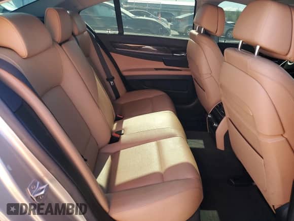 2014 BMW 7 Series 740i с VIN WBAYA6C58ED826697, выставлен на аукционе Copart как лот 57130385 с пробегом 50 107 миль миль и Списание • Salvage title. История ставок и продаж доступна на DreamBid. Изображение 10.