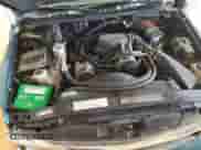 1997 Chevrolet Blazer LS with VIN 1GNDT13W3V2227216, listed as a Copart auction lot 80871195 with 152,294 mi miles and Salvage title. Bid and sale history available at DreamBid. Image 12.