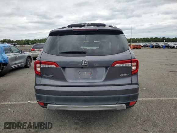 2021 Honda Pilot EX-L z VIN 5FNYF6H51MB062521, wystawiony jako Copart lot #69946005 z przebiegiem 74 560 mil mil oraz Szkoda całkowita • Salvage title. Historia ofert i sprzedaży dostępna na DreamBid. Obrazek 6.