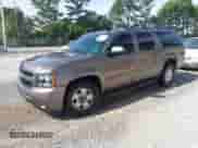 2011 Chevrolet Suburban LT z VIN 1GNSCJE09BR344091, wystawiony jako IAAI lot #43487649 z przebiegiem 182 652 mil mil oraz . Historia ofert i sprzedaży dostępna na DreamBid. Obrazek 2.