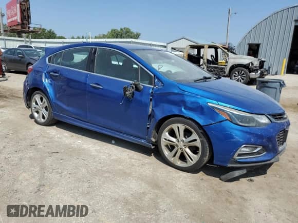 2017 Chevrolet Cruze Premier z VIN 3G1BF6SM7HS577549, wystawiony jako Copart lot #69048945 z przebiegiem 233 394 mil mil oraz Szkoda całkowita • Salvage title. Historia ofert i sprzedaży dostępna na DreamBid. Obrazek 4.