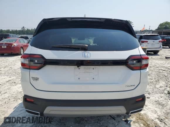 2023 Honda Pilot Touring с VIN 5FNYG2H77PB014212, выставлен на аукционе Copart как лот 59222715 с пробегом 4 507 миль миль и Списание • Salvage title. История ставок и продаж доступна на DreamBid. Изображение 6.