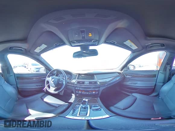 2014 BMW 7 Series 740i с VIN WBAYA6C50ED144560, выставлен на аукционе Copart как лот 64113155 с пробегом 122 004 миль миль и Списание • Salvage title. История ставок и продаж доступна на DreamBid. Изображение 14.