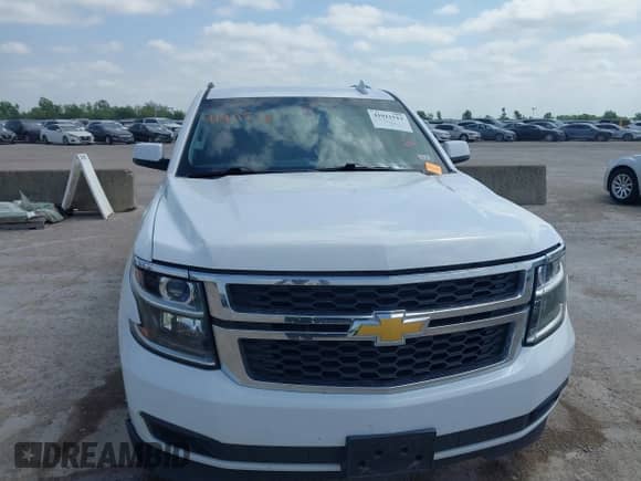 2017 Chevrolet Tahoe LS with VIN 1GNSCAKC3HR219434, listed as a IAAI auction lot 41911513 with 164,967 mi miles and . Bid and sale history available at DreamBid. Image 6.