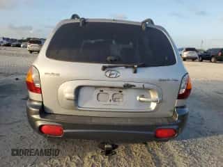 2001 Hyundai Santa Fe GLS z VIN KM8SC83DX1U090034, wystawiony jako Copart lot #79499434 z przebiegiem 170 605 mil mil oraz Czysty tytuł • Clean title. Historia ofert i sprzedaży dostępna na DreamBid. Obrazek 6.