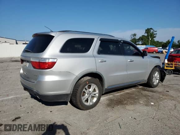 2011 Dodge Durango Crew with VIN 1D4SE4GT6BC594373, listed as a Copart auction lot 65832825 with 169,594 mi miles and Salvage title. Bid and sale history available at DreamBid. Image 3.