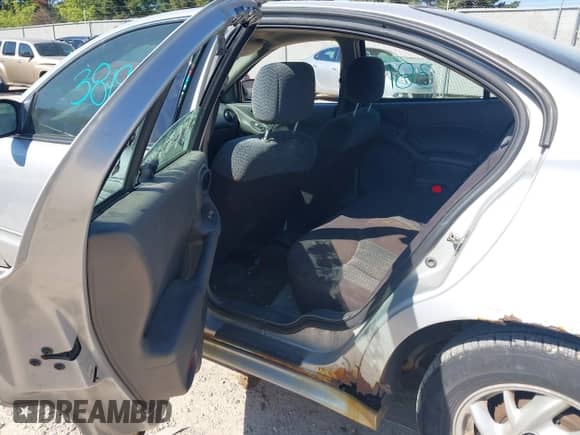 2004 Pontiac Grand Am SE1 with VIN 1G2NF52EX4C200337, listed as a IAAI auction lot 43313819 with Not provided miles and . Bid and sale history available at DreamBid. Image 8.