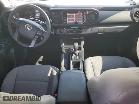 2022 Toyota Tacoma SR с VIN 3TMCZ5AN0NM485982, выставлен на аукционе Copart как лот 70948235 с пробегом 25 754 миль миль и Списание • Salvage title. История ставок и продаж доступна на DreamBid. Изображение 8.