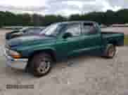 2003 Dodge Dakota SLT с VIN 1D7HL48N73S366294, выставлен на аукционе Copart как лот 71228564 с пробегом 281 401 миль миль и Списание • Salvage title. История ставок и продаж доступна на DreamBid. Изображение 1.