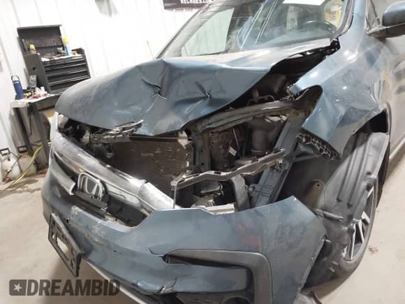 2019 Honda Pilot Touring 7-Passenger with VIN 5FNYF6H64KB004134, listed as a IAAI auction lot 43353616 with 92,735 mi miles and . Bid and sale history available at DreamBid. Image 6.