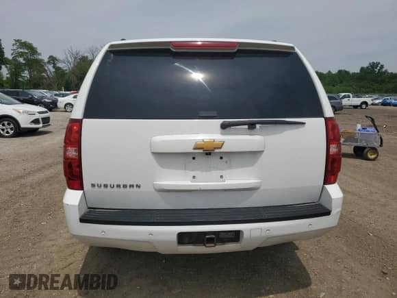 2014 Chevrolet Suburban LT с VIN 1GNSKJE74ER216751, выставлен на аукционе Copart как лот 59591105 с пробегом 203 302 миль миль и Списание • Salvage title. История ставок и продаж доступна на DreamBid. Изображение 6.