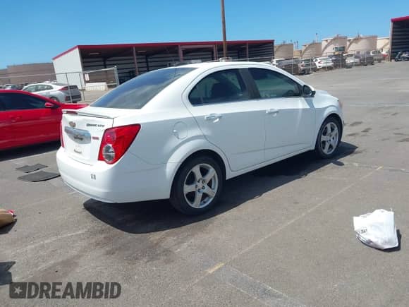2016 Chevrolet Sonic LTZ with VIN 1G1JE5SB0G4140823, listed as a IAAI auction lot 43078859 with 94,417 mi miles and . Bid and sale history available at DreamBid. Image 4.