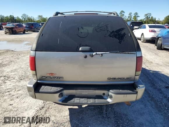 1999 Chevrolet Blazer LS с VIN 1GNCS18W4XK190199, выставлен на аукционе Copart как лот 81499174 с пробегом 161 229 миль миль и Списание • Salvage title. История ставок и продаж доступна на DreamBid. Изображение 6.