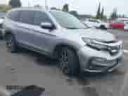 2019 Honda Pilot Elite z VIN 5FNYF6H02KB095402, wystawiony jako IAAI lot #42967099 z przebiegiem 100 310 mil mil oraz . Historia ofert i sprzedaży dostępna na DreamBid. Obrazek 1.